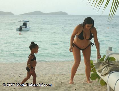 Anne aday Kim Kardahian bikinisi ile kameralara yakaland.